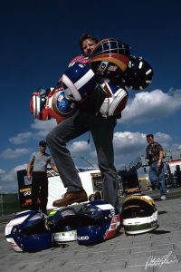 How many helmets can one person carry? German GP 1996